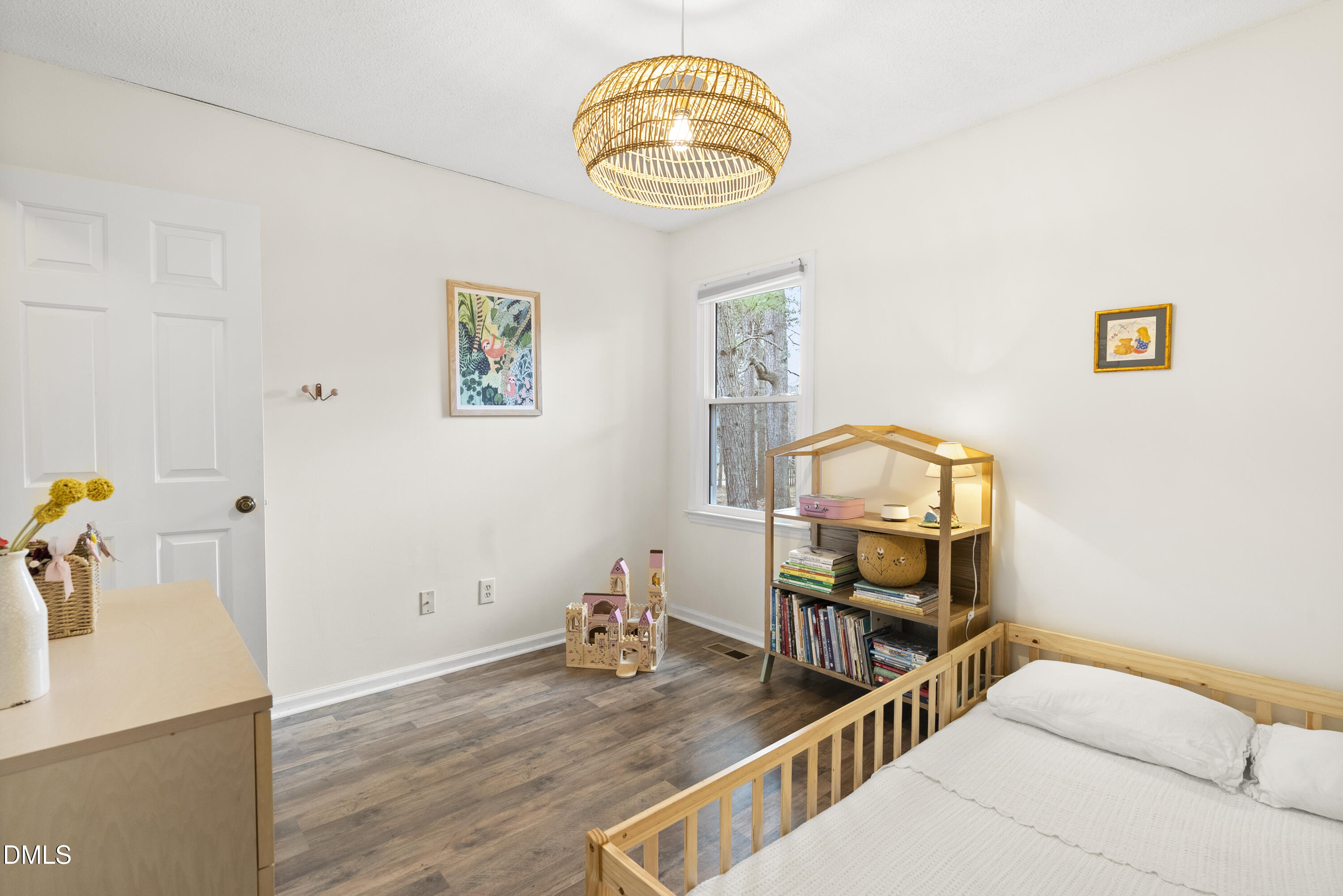 1515 Hemphill Drive Raleigh, NC 27609 - Photo 26 of 46 a view of a bedroom with furniture and wooden floor