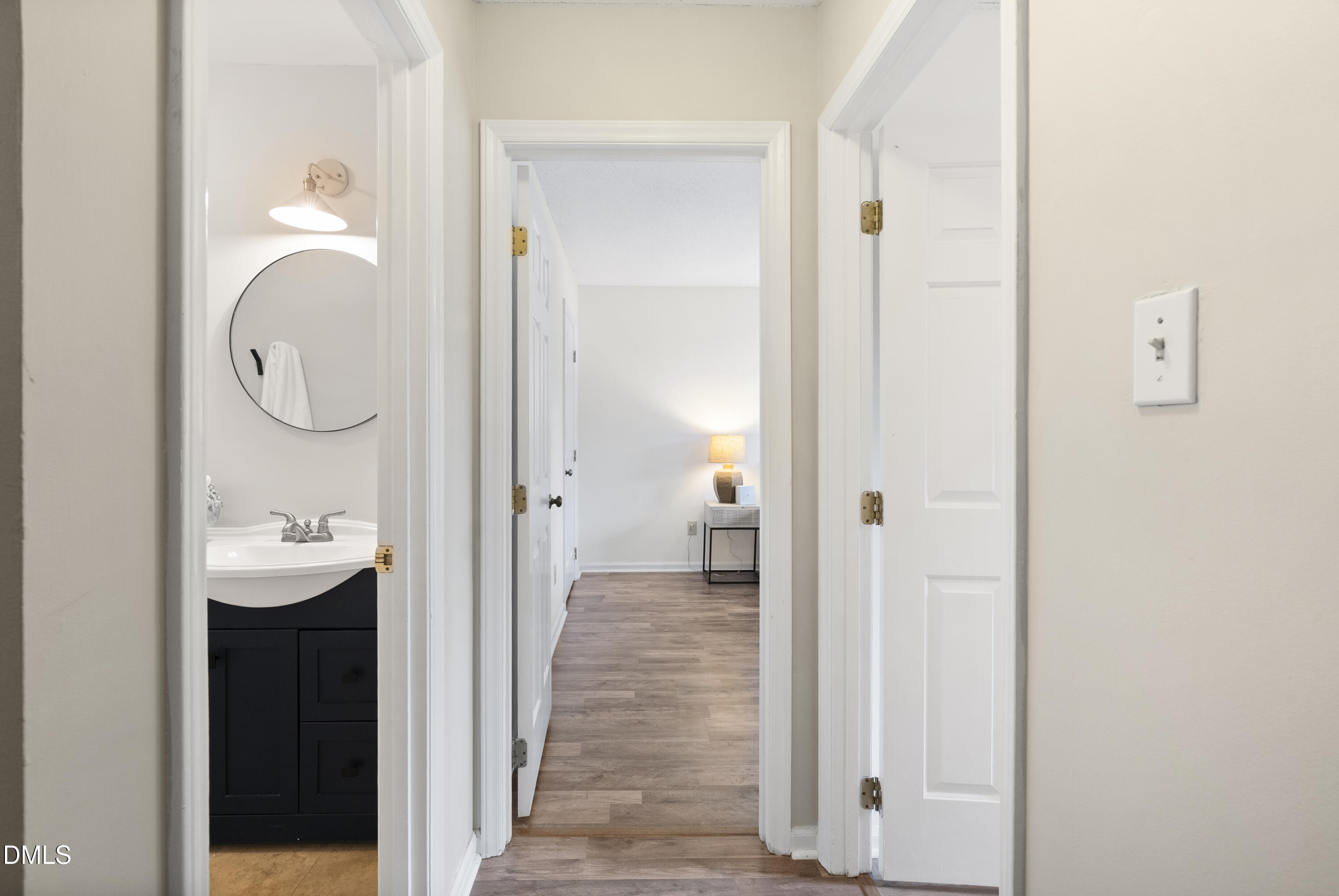 1515 Hemphill Drive Raleigh, NC 27609 - Photo 29 of 46 a bathroom with a sink and a mirror