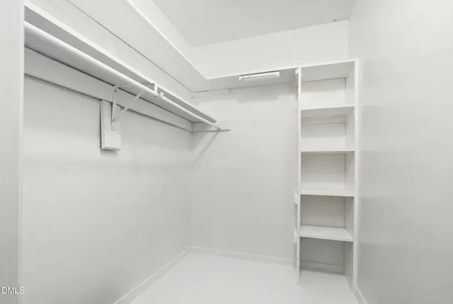 a view of an empty walk in closet