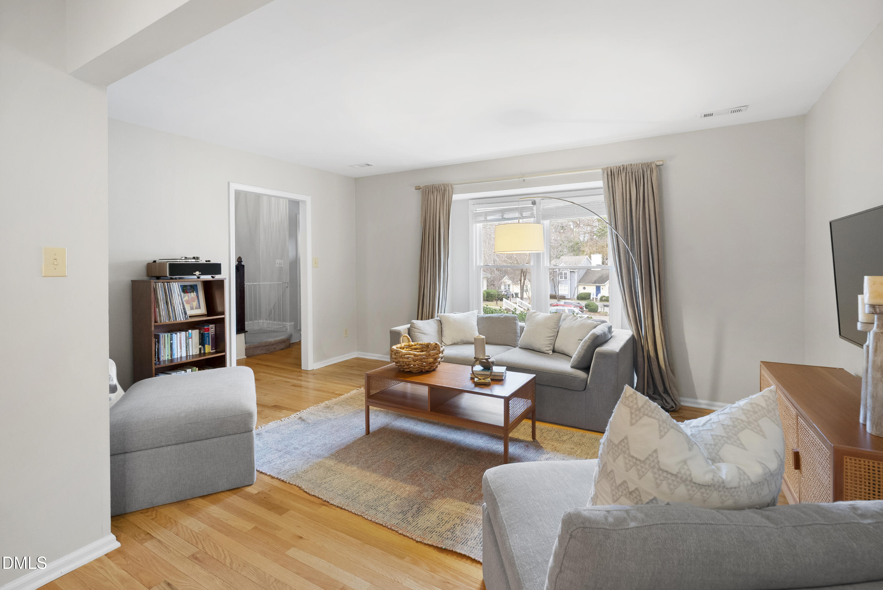 1515 Hemphill Drive Raleigh, NC 27609 - Photo 3 of 46 a living room with furniture and a large window