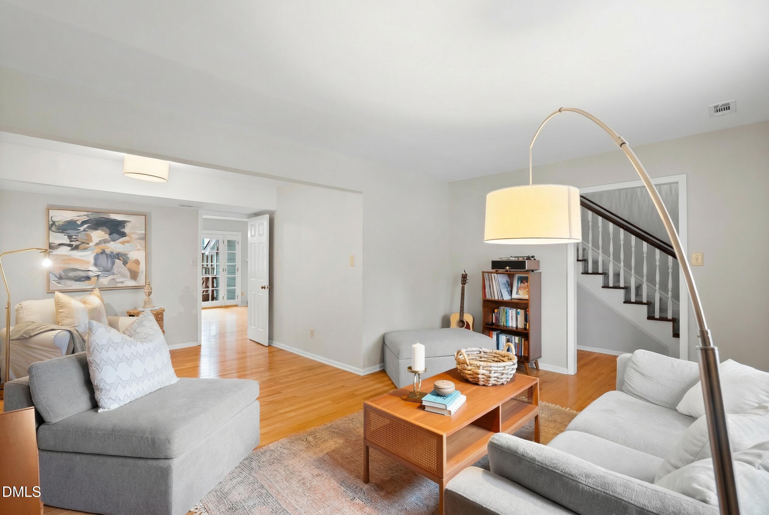 1515 Hemphill Drive Raleigh, NC 27609 - Photo 4 of 46 a living room with furniture and wooden floor