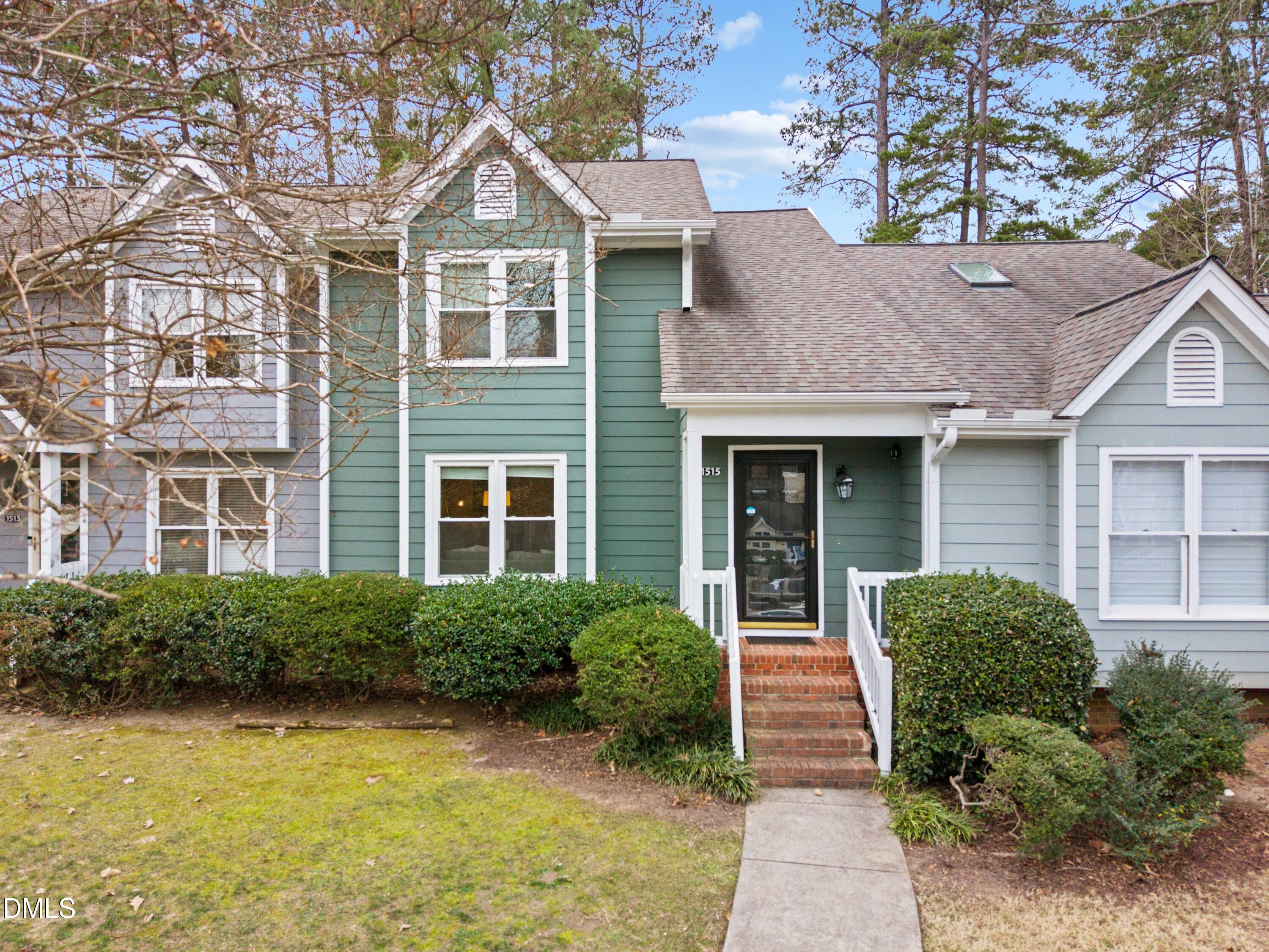 1515 Hemphill Drive Raleigh, NC 27609 - Photo 43 of 46 a front view of a house with garden