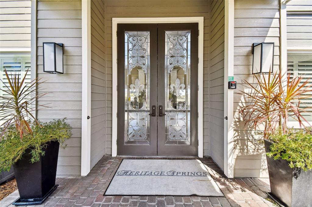 12202 Aaron Terrace Trinity, FL 34655 - Photo 39 of 41 a view of a entryway door of the house