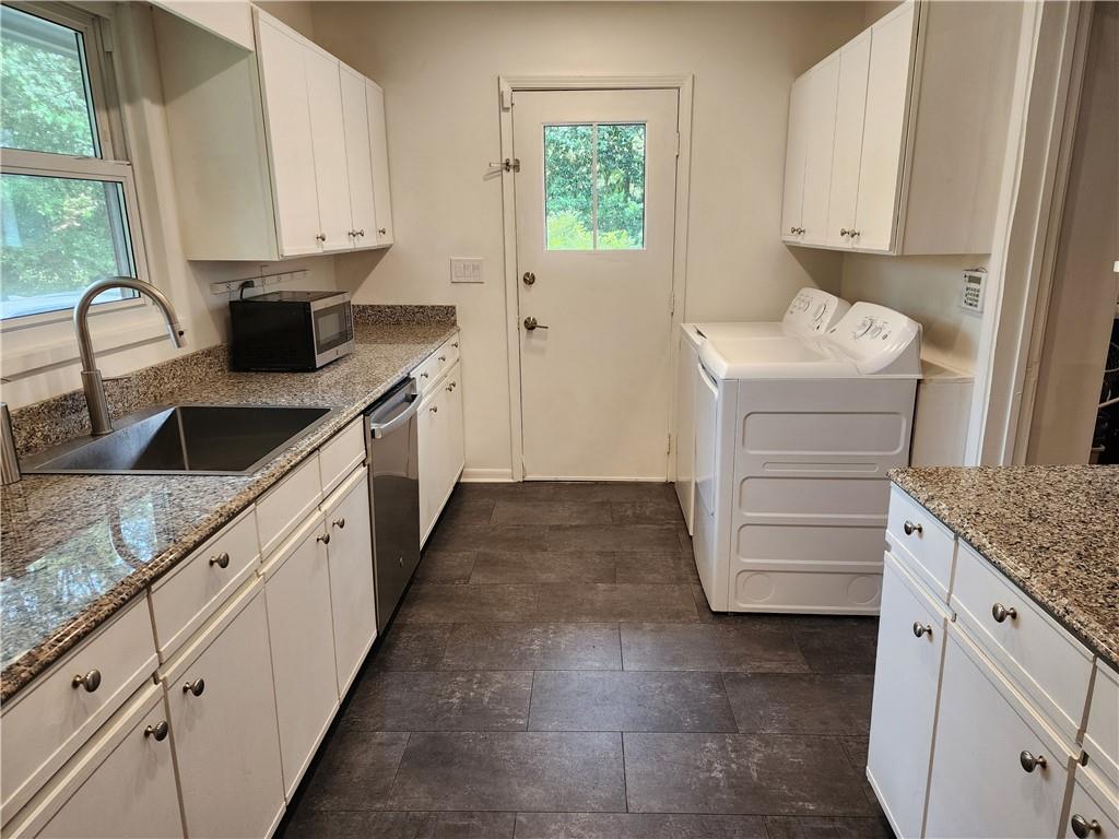 2037 B Lively Ridge Road Northeast Atlanta, GA 30329 - Photo 6 of 18 a kitchen with a sink and cabinets