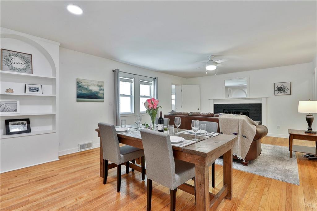 2037 B Lively Ridge Road Northeast Atlanta, GA 30329 - Photo 10 of 18 a view of a dining room with furniture window and wooden floor