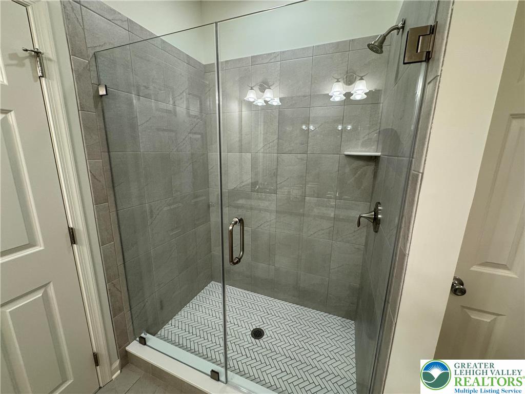 113 Timber Trail, Unit 54 Easton, PA 18045 - Photo 13 of 24 a bathroom with a shower