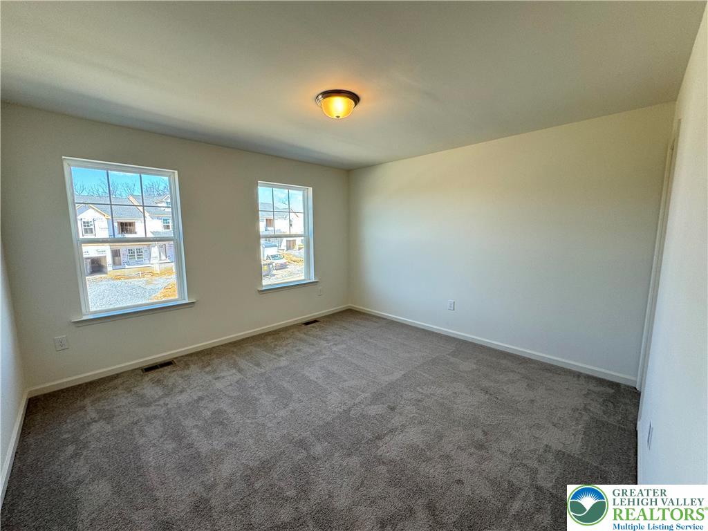 113 Timber Trail, Unit 54 Easton, PA 18045 - Photo 15 of 24 an empty room with windows