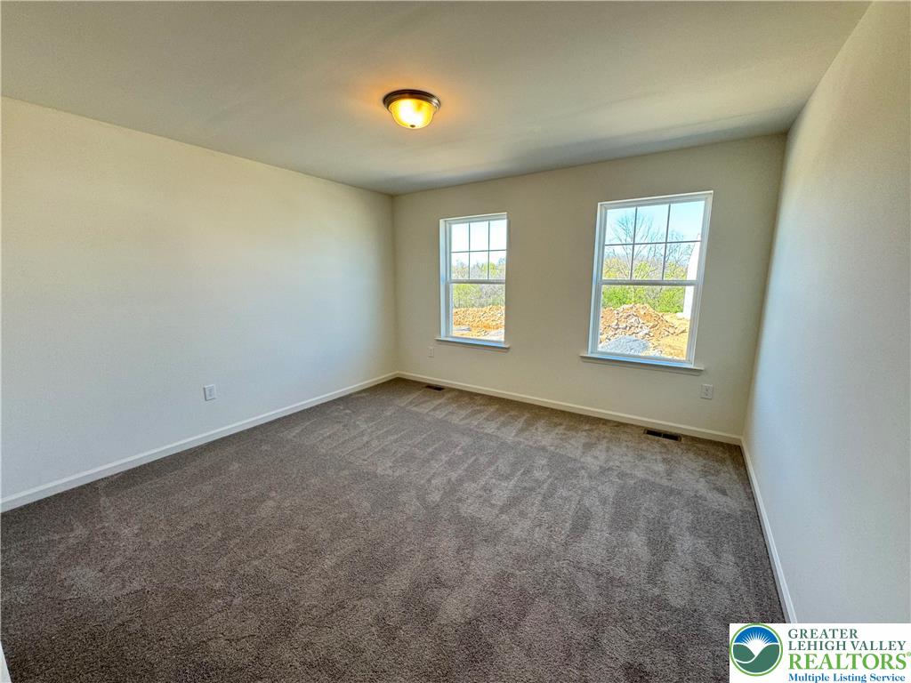 113 Timber Trail, Unit 54 Easton, PA 18045 - Photo 17 of 24 an empty room with windows