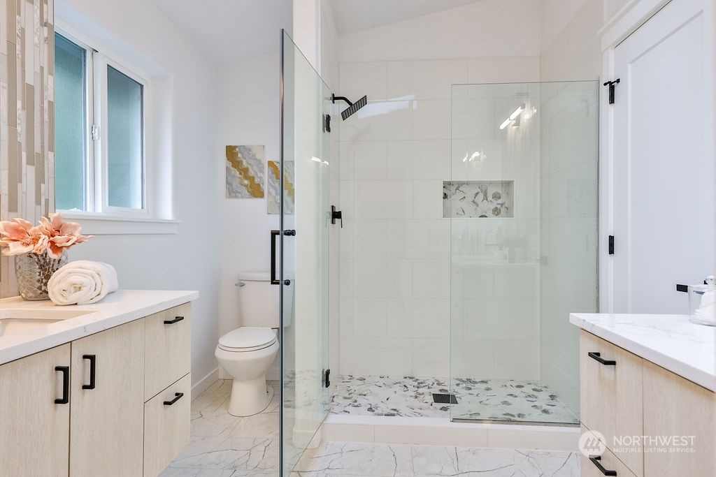 11026 Trombley Road Snohomish, WA 98290 - Photo 18 of 30 a bathroom with a sink a toilet and shower