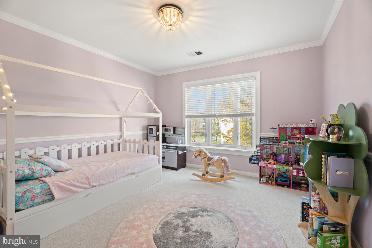 13534 King Charles Drive Chantilly, VA 20151 - Photo 20 of 28 a bed room with furniture and a window