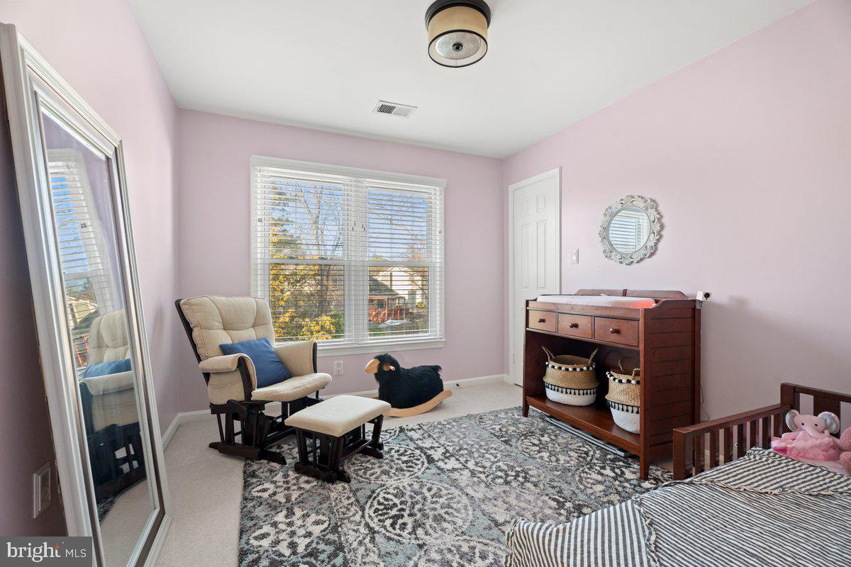 13534 King Charles Drive Chantilly, VA 20151 - Photo 21 of 28 a living room with furniture and a window