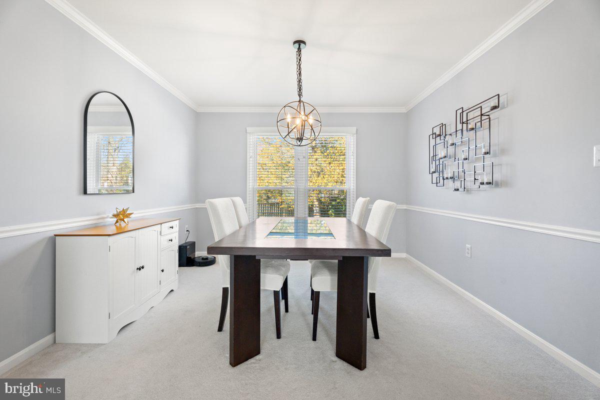 13534 King Charles Drive Chantilly, VA 20151 - Photo 4 of 28 a view of a dining room with furniture and window