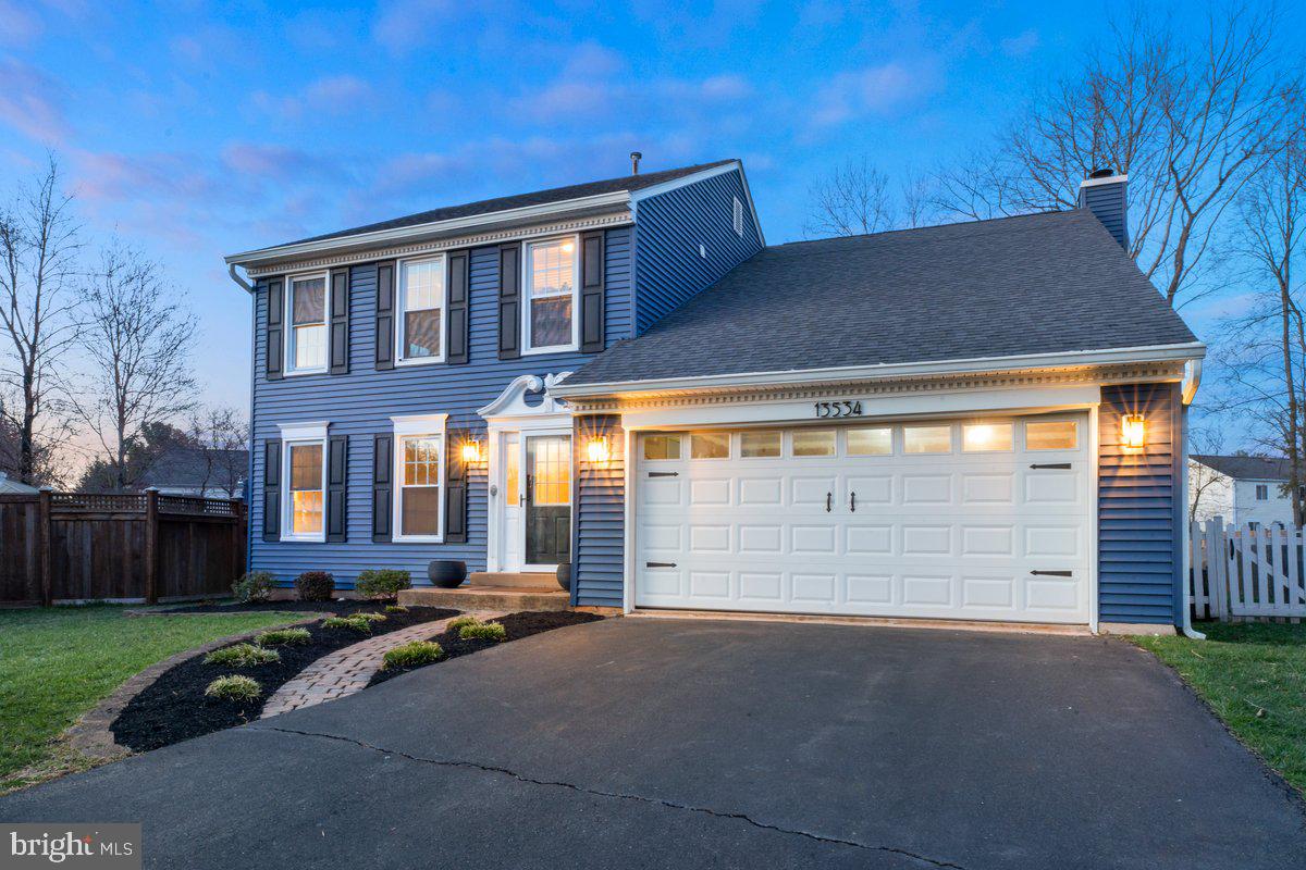 13534 King Charles Drive Chantilly, VA 20151 - Photo 9 of 28 a front view of a house with a yard