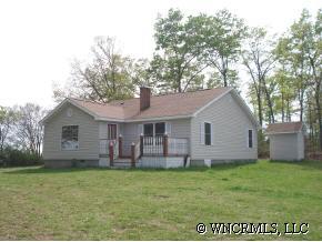 398 Dewitt Owens Road Rutherfordton, NC 28139 - Photo 1 of 12 a view of a house with a yard