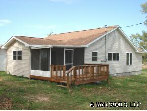 398 Dewitt Owens Road Rutherfordton, NC 28139 - Photo 2 of 12 a view of a house with a yard and porch