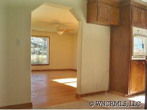 398 Dewitt Owens Road Rutherfordton, NC 28139 - Photo 6 of 12 a view of an empty room with a window