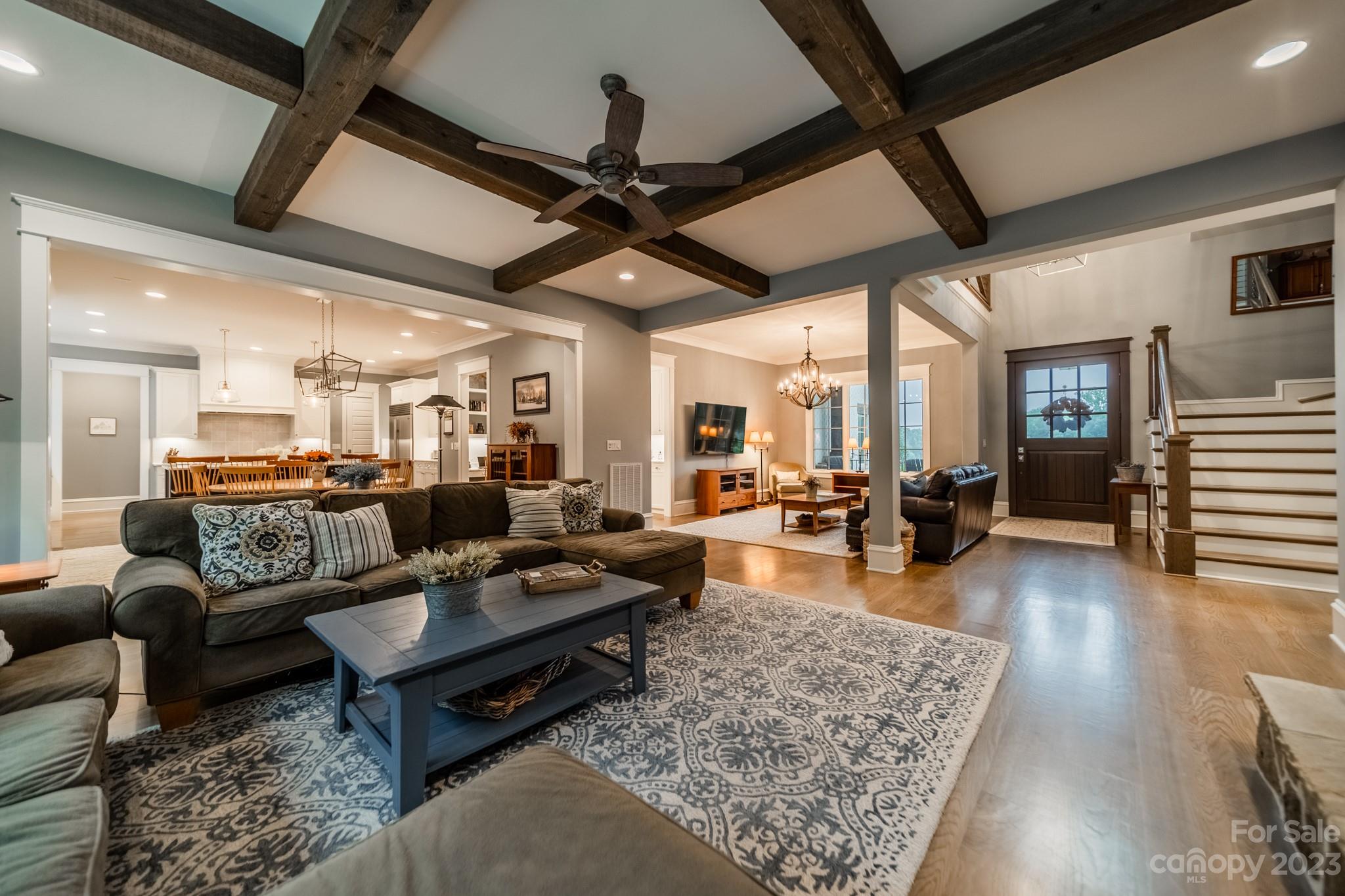 721 Lester Davis Road Waxhaw, NC 28173 - Photo 18 of 48 a living room with furniture and a wooden floor