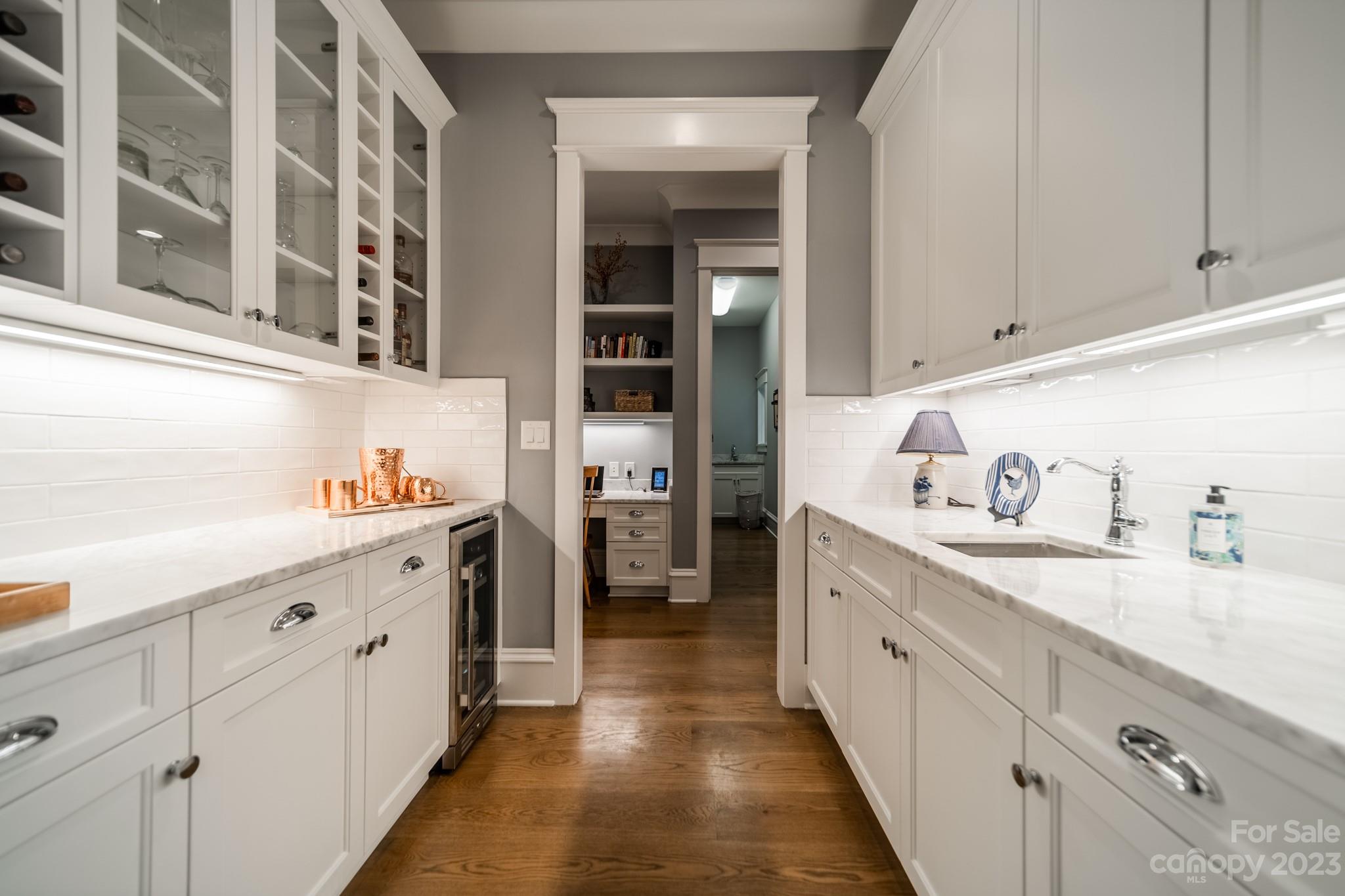 721 Lester Davis Road Waxhaw, NC 28173 - Photo 24 of 48 a kitchen with cabinets and window