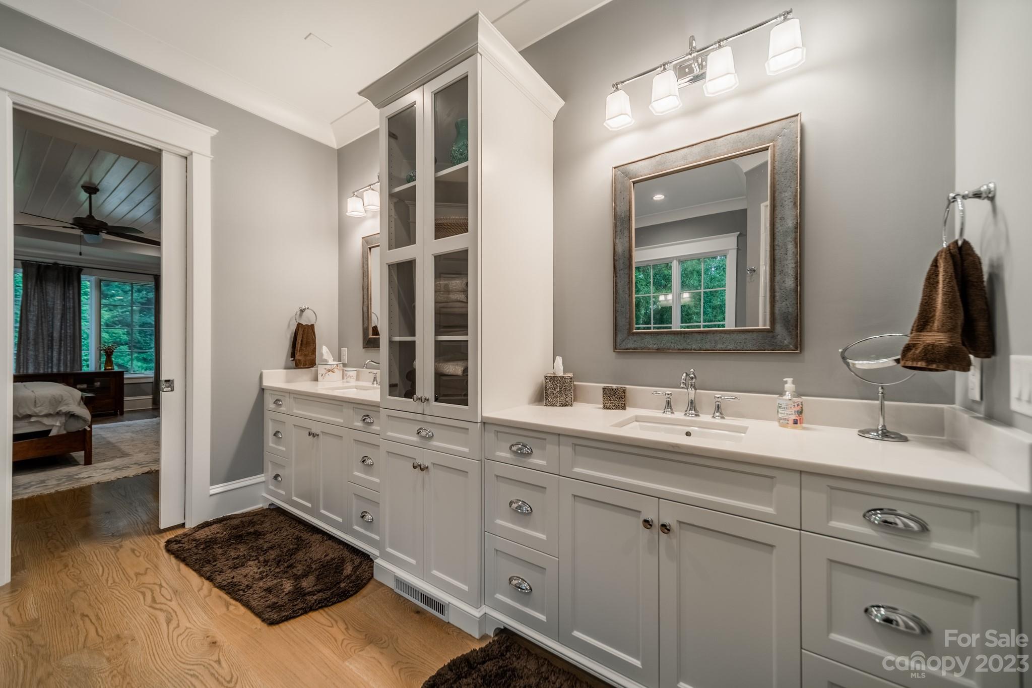721 Lester Davis Road Waxhaw, NC 28173 - Photo 28 of 48 a bathroom with a sink and a mirror
