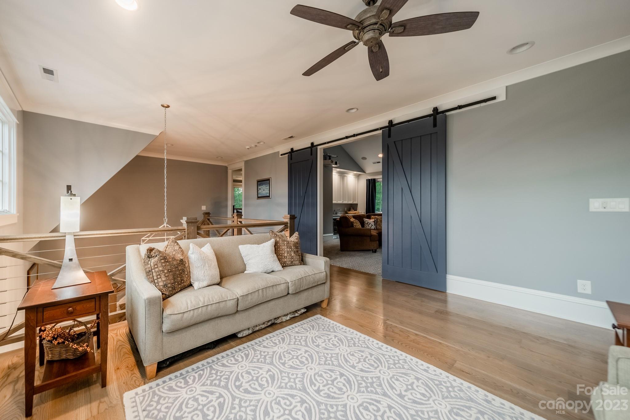 721 Lester Davis Road Waxhaw, NC 28173 - Photo 31 of 48 a living room with furniture and a rug