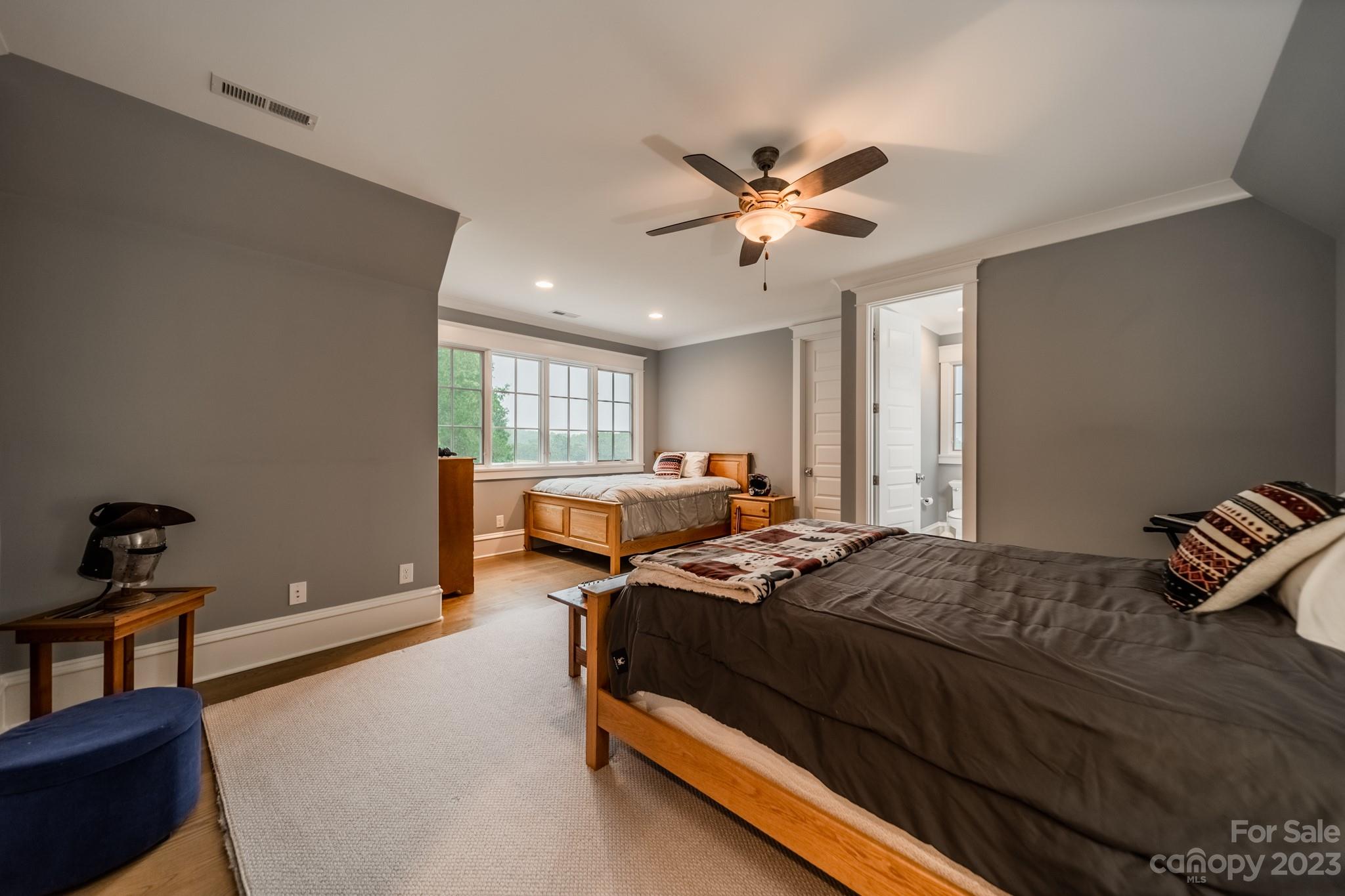 721 Lester Davis Road Waxhaw, NC 28173 - Photo 36 of 48 a bedroom with bed and window