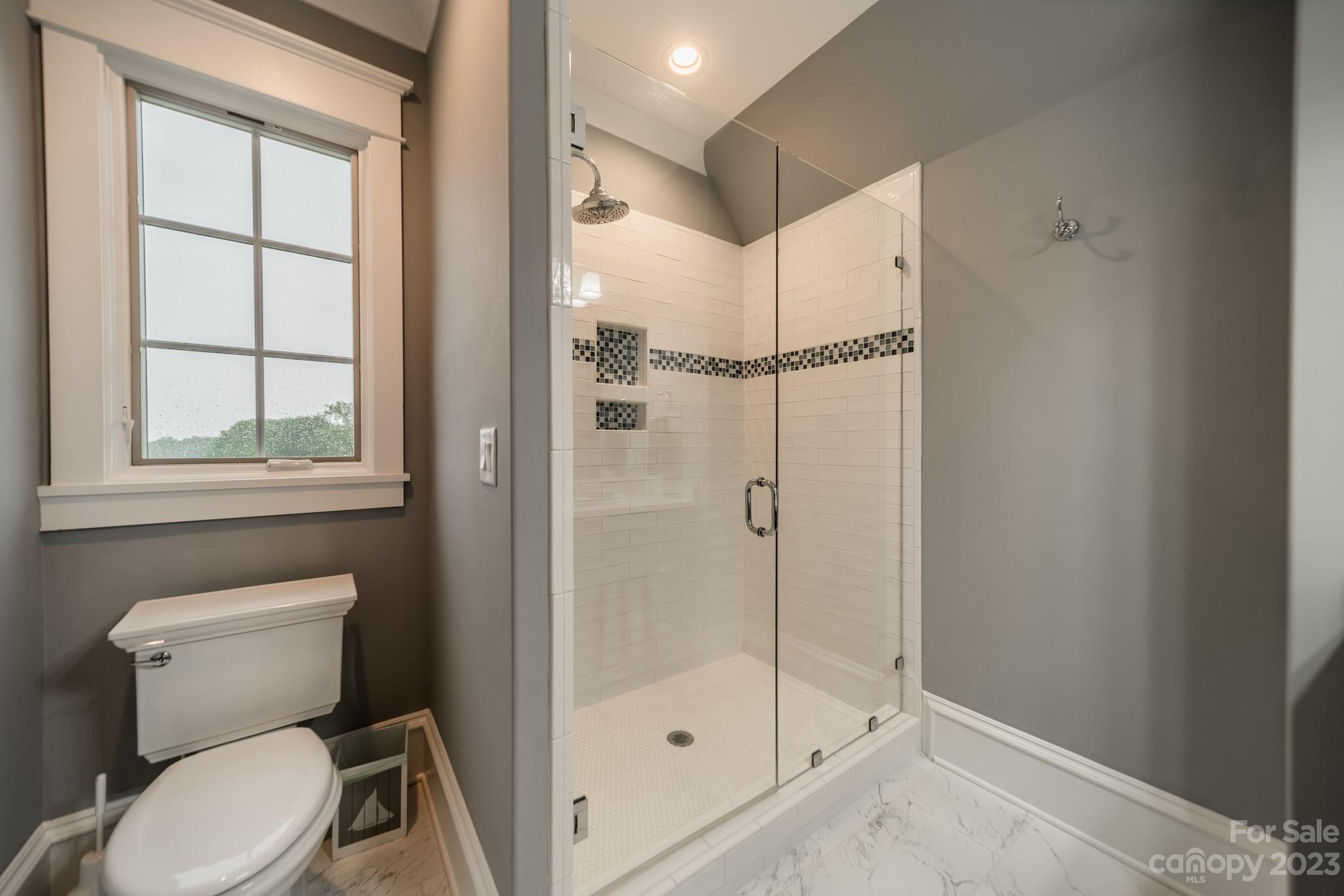 721 Lester Davis Road Waxhaw, NC 28173 - Photo 37 of 48 a bathroom with a toilet and a shower