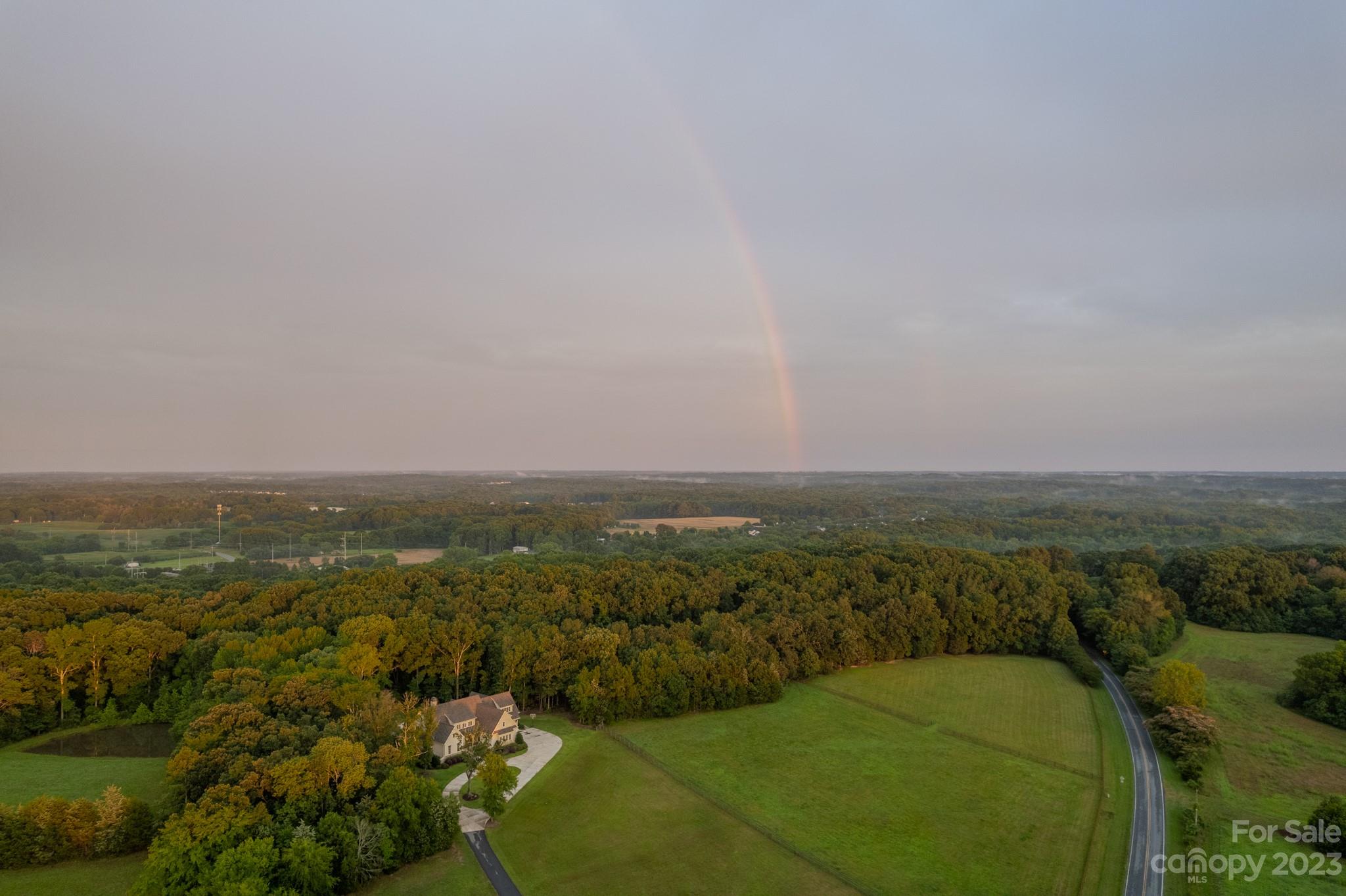 721 Lester Davis Road Waxhaw, NC 28173 - Photo 48 of 48 an aerial view of residential houses with outdoor space and trees