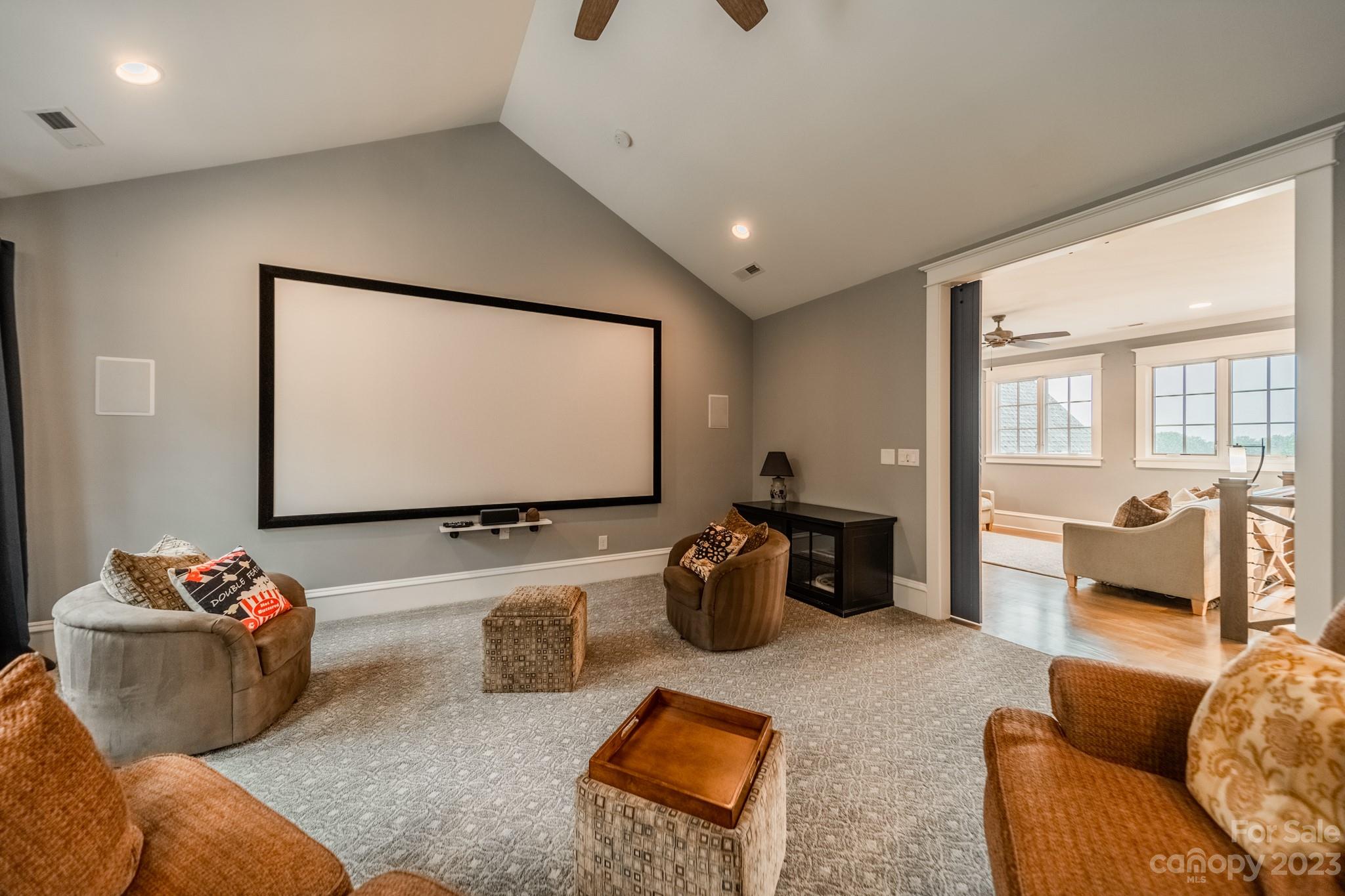 721 Lester Davis Road Waxhaw, NC 28173 - Photo 9 of 48 a living room with furniture and a flat screen tv