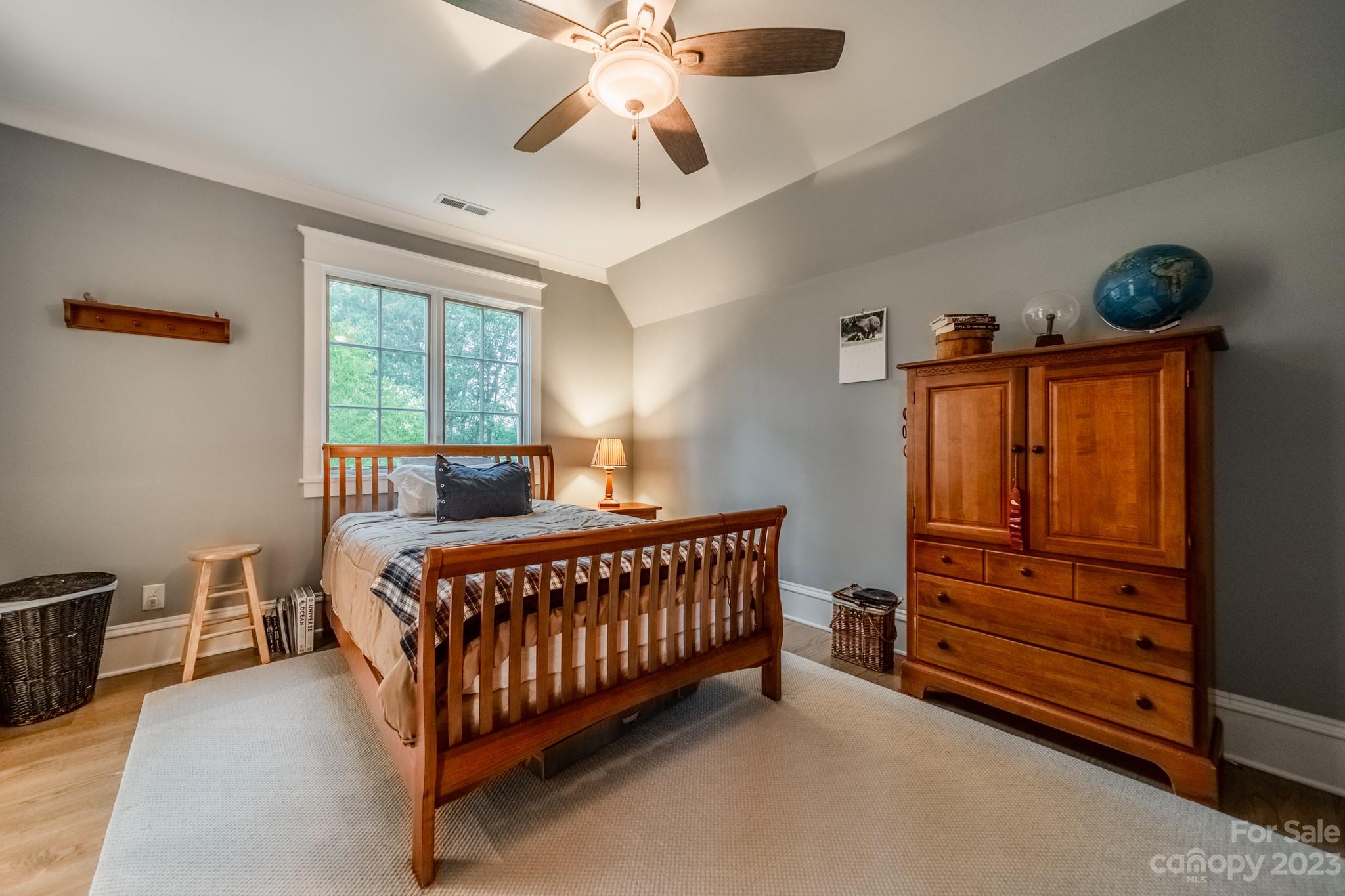 721 Lester Davis Road Waxhaw, NC 28173 - Photo 10 of 48 a bedroom with a bed and a window