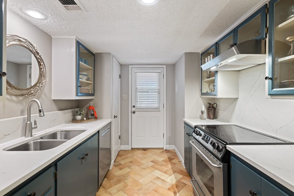 3500 Enfield Road, Unit E Austin, TX 78703 - Photo 23 of 40 Recessed lighting elevates the space.