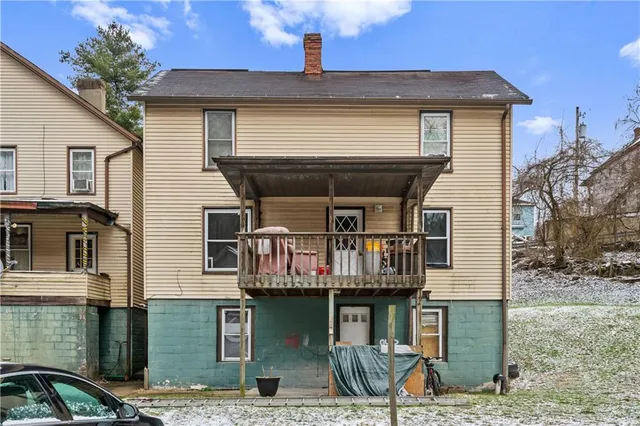 a front view of a house with balcony