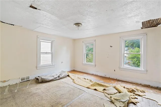 a view of a bedroom with window