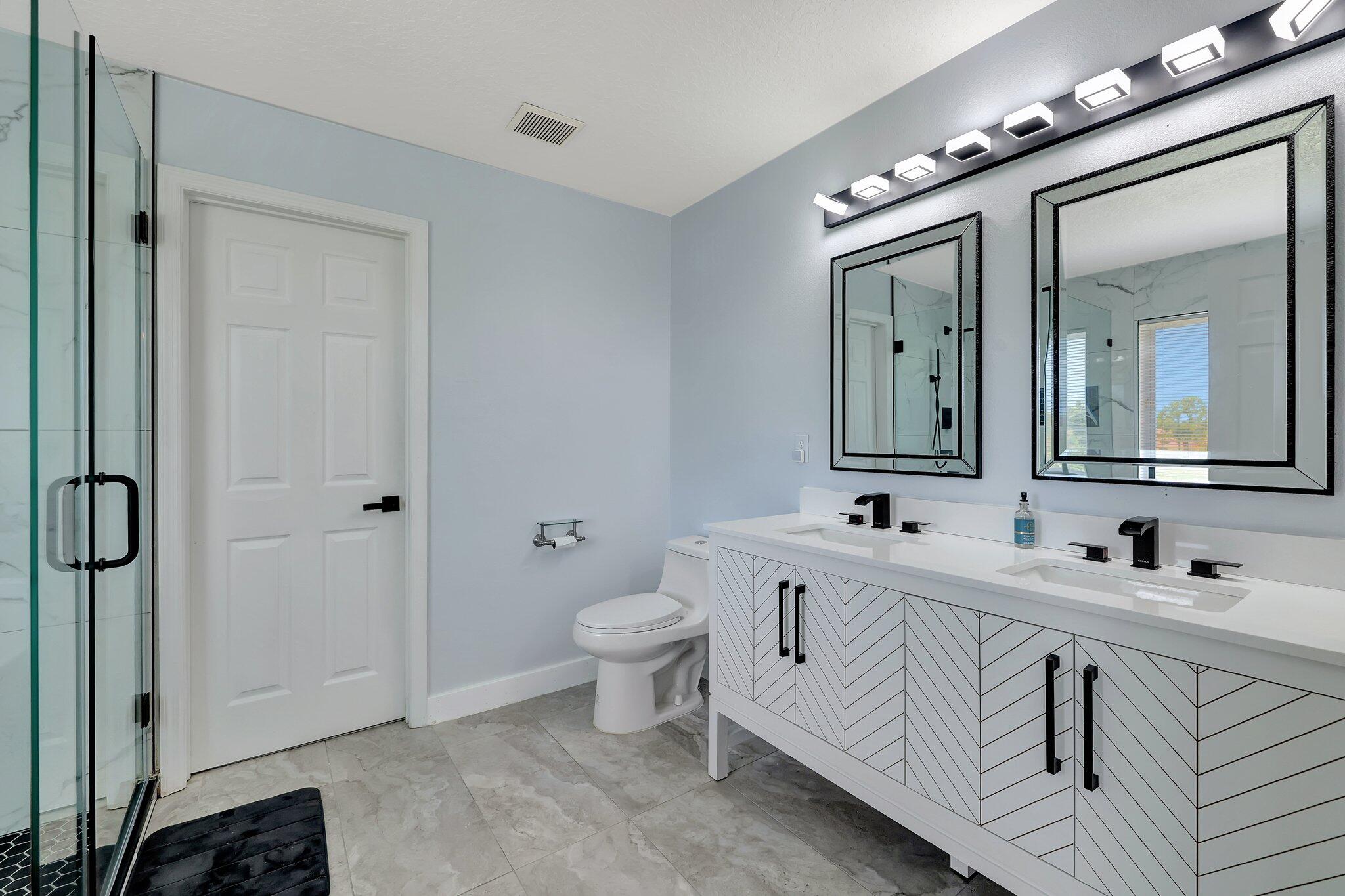 6509 Northwest Omega Road Port St. Lucie, FL 34983 - Photo 28 of 58 Bathroom