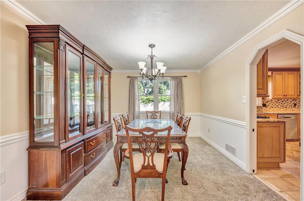 5015 Julia Lane McKees Rocks, PA 15136 - Photo 15 of 45 a view of a dining room with furniture window and outside view