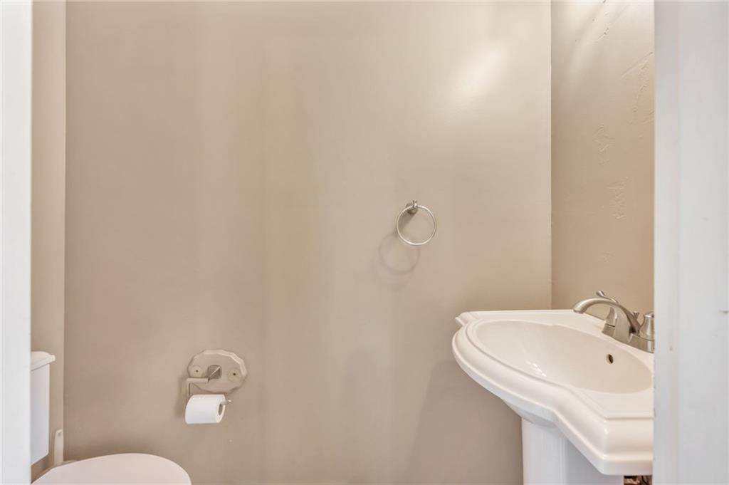 5015 Julia Lane McKees Rocks, PA 15136 - Photo 21 of 45 a bathroom with a sink and mirror