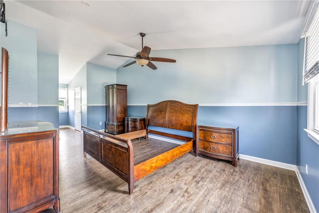 5015 Julia Lane McKees Rocks, PA 15136 - Photo 22 of 45 a living room with kitchen view and wooden floor