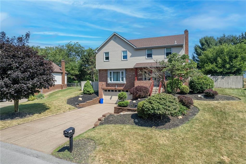5015 Julia Lane McKees Rocks, PA 15136 - Photo 3 of 45 front view of a house with a yard