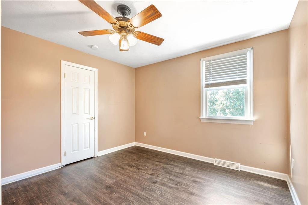 5015 Julia Lane McKees Rocks, PA 15136 - Photo 31 of 45 an empty room with a window and a fan