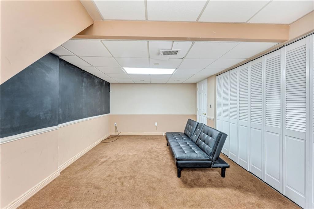 5015 Julia Lane McKees Rocks, PA 15136 - Photo 34 of 45 a living room with furniture and a wooden floor
