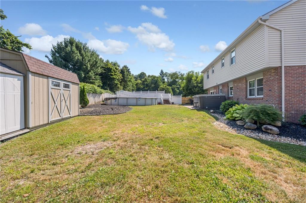 5015 Julia Lane McKees Rocks, PA 15136 - Photo 36 of 45 a swimming pool with outdoor seating and yard