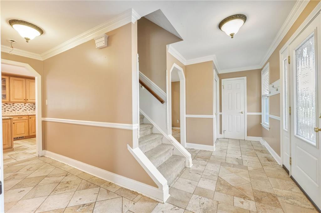 5015 Julia Lane McKees Rocks, PA 15136 - Photo 5 of 45 a view of a hallway with wooden floor and entryway