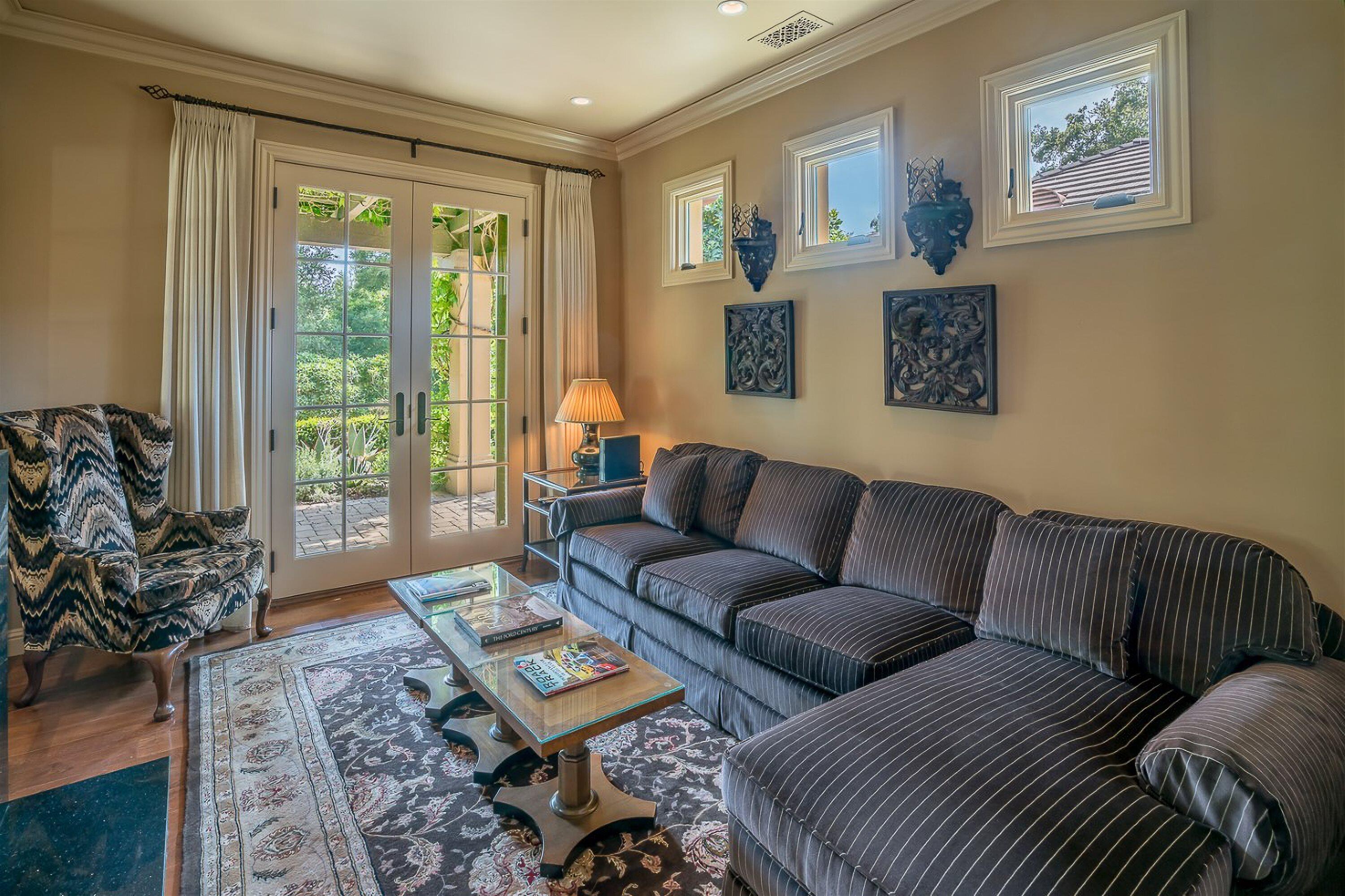 741 Hot Springs Road Santa Barbara, CA 93108 - Photo 11 of 24 a living room with furniture and a window
