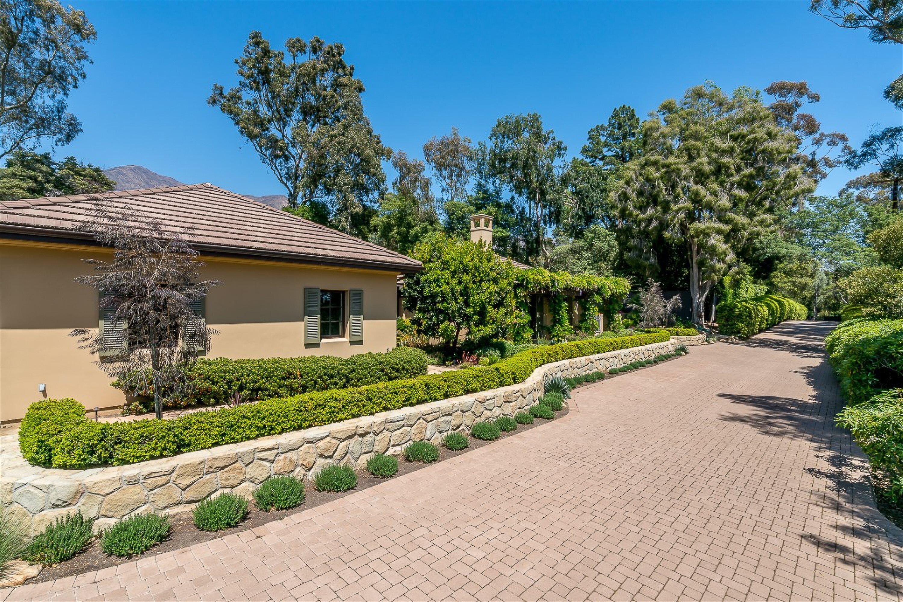 741 Hot Springs Road Santa Barbara, CA 93108 - Photo 17 of 24 a front view of a house with a yard