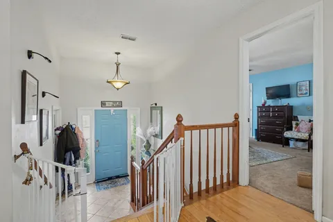 a view of a bedroom with gym equipment
