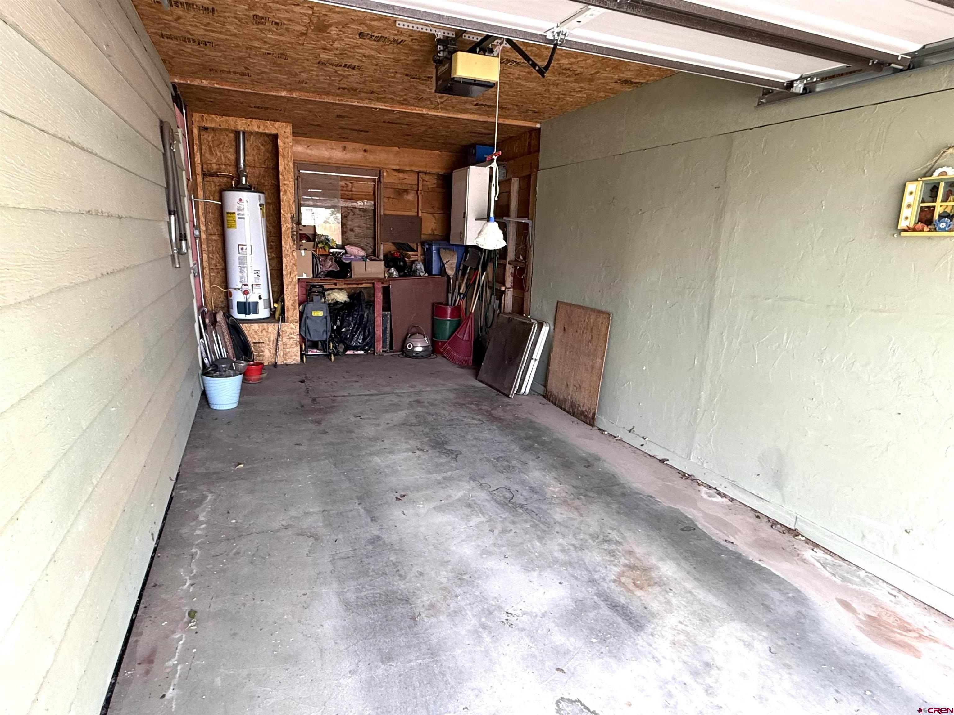 609 East 2nd Street Cortez, CO 81321 - Photo 15 of 21 a view of a room with wooden floor and a window