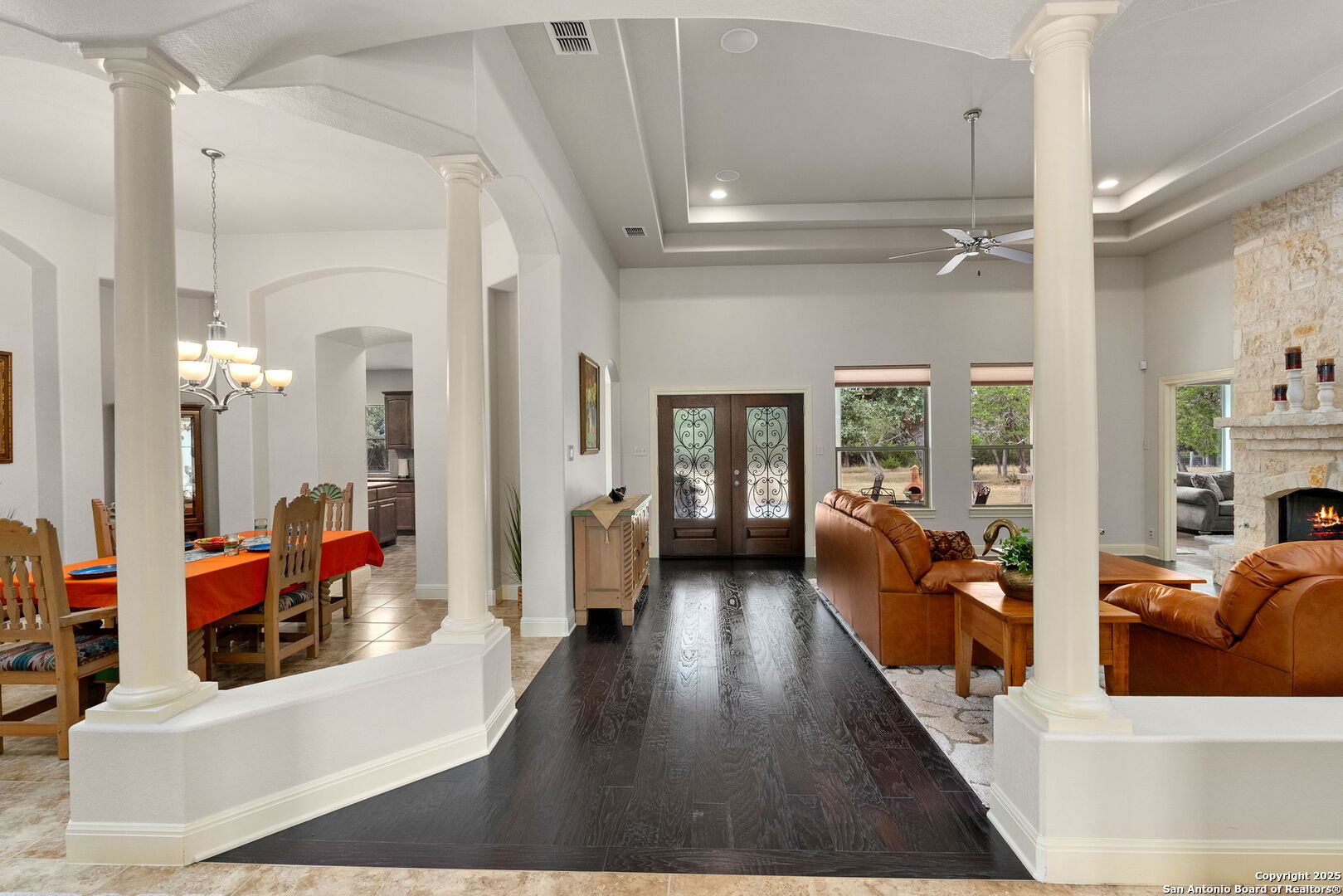 2956 Rio Cordillera Boerne, TX 78006 - Photo 11 of 41 a living room with furniture and a chandelier