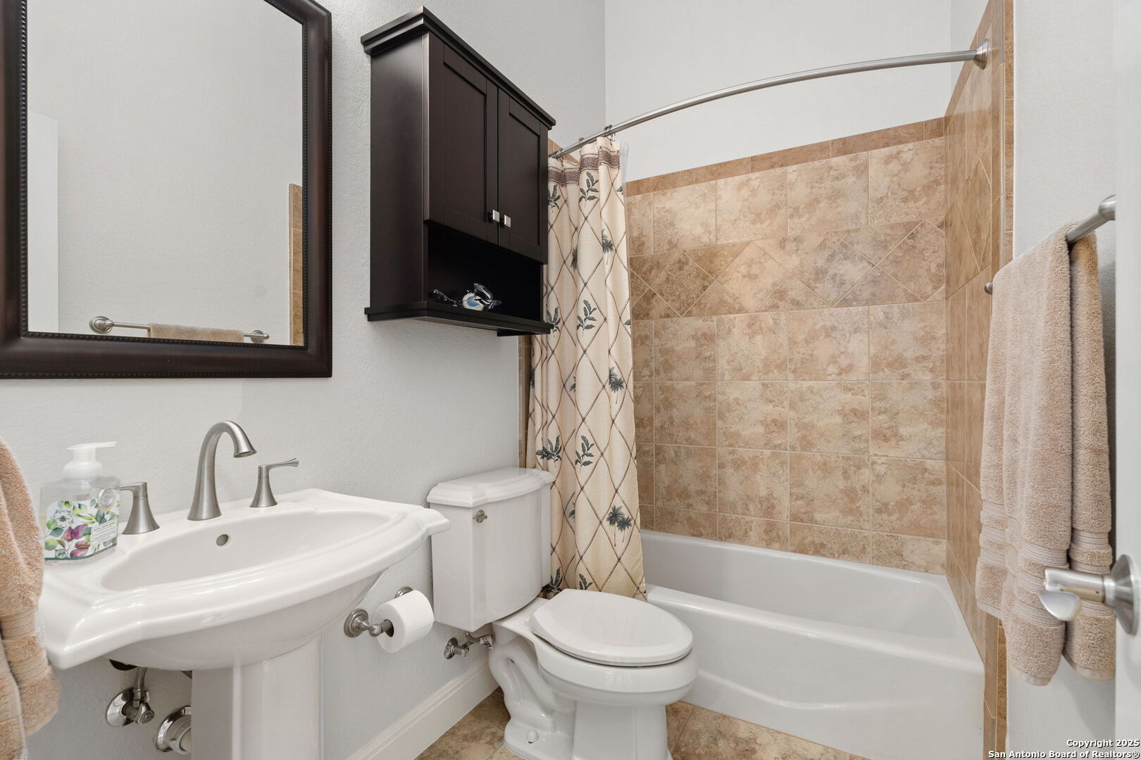 2956 Rio Cordillera Boerne, TX 78006 - Photo 27 of 41 a bathroom with a sink toilet and shower