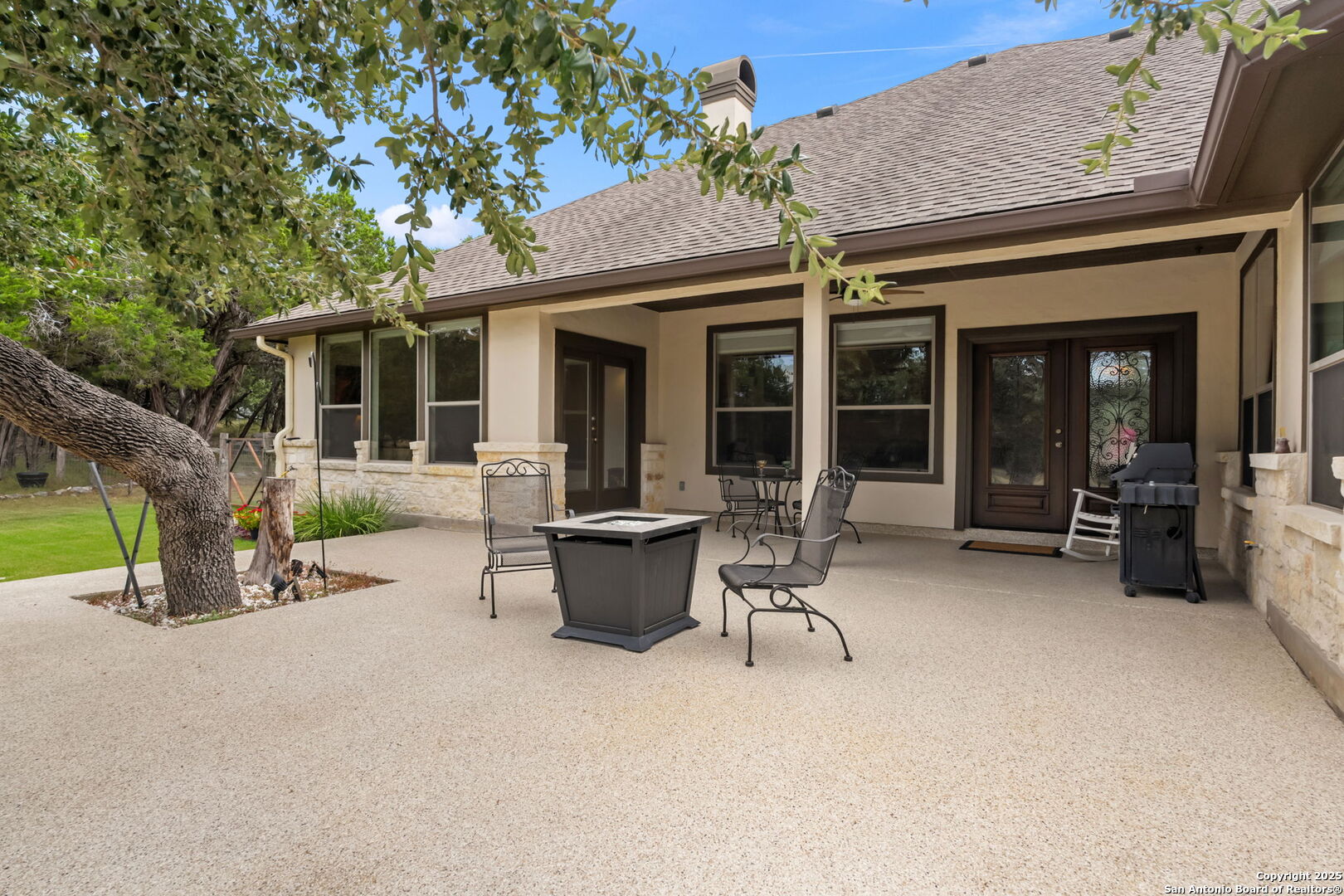 2956 Rio Cordillera Boerne, TX 78006 - Photo 34 of 41 a view of a house with patio and a garden