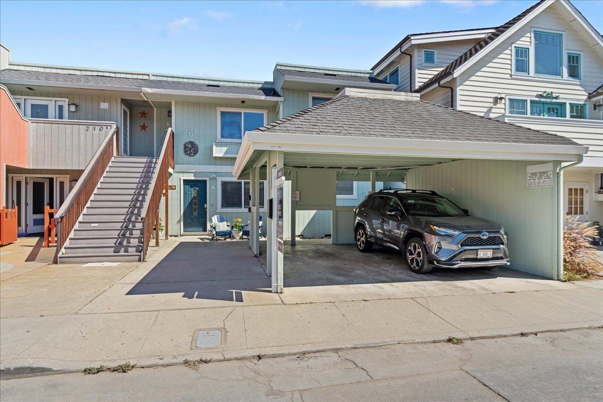 a view of a car parked in front of a house