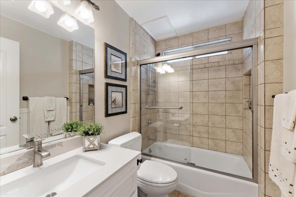 208 Stockton Avenue Capitola, CA 95010 - Photo 18 of 36 a bathroom with a bathtub shower sink and toilet